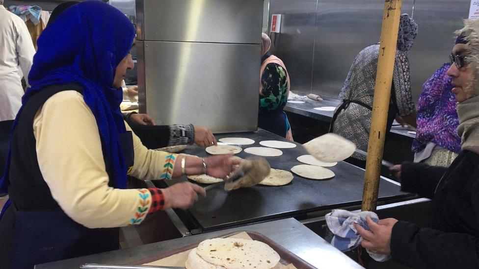 Women making chapatti