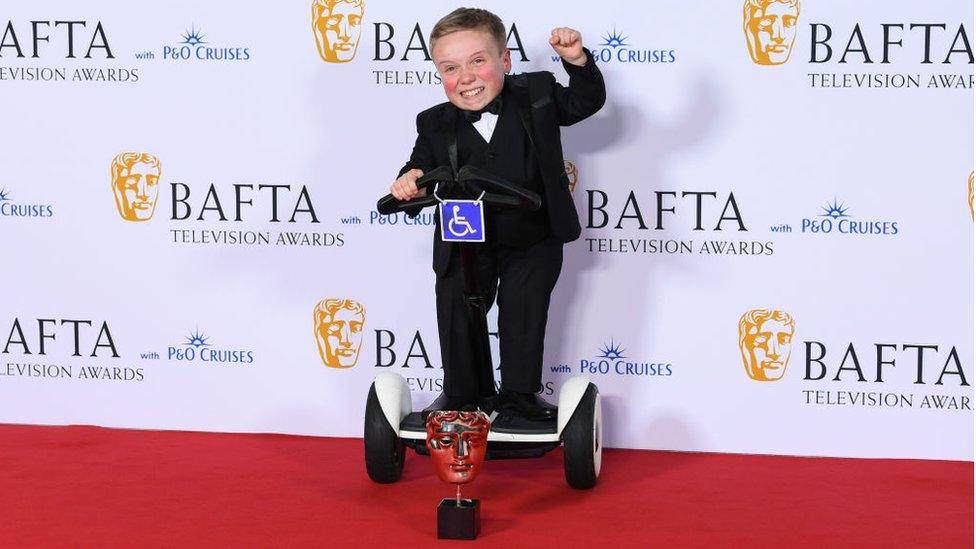 Lenny Rush celebrating his BAFTA win