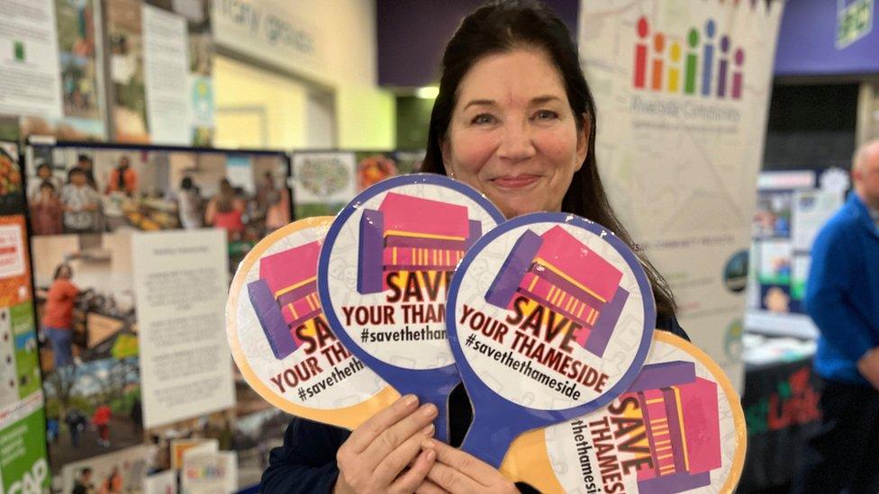 Teresa O'Keeffe holding a sign that says Save Your Thameside