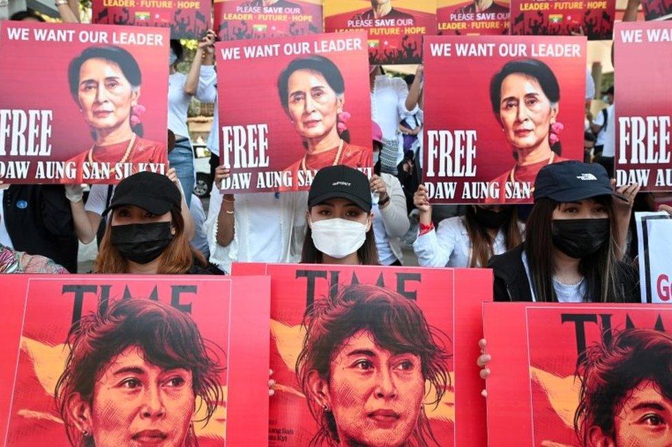 File photo: Demonstrators hold up signs during a protest against the military coup and demanding the release of elected leader Aung San Suu Kyi, in Yangon, Myanmar, February 13, 2021