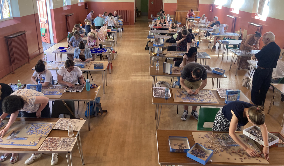 Competitors working on the jigsaws at the British Jigsaw Competition