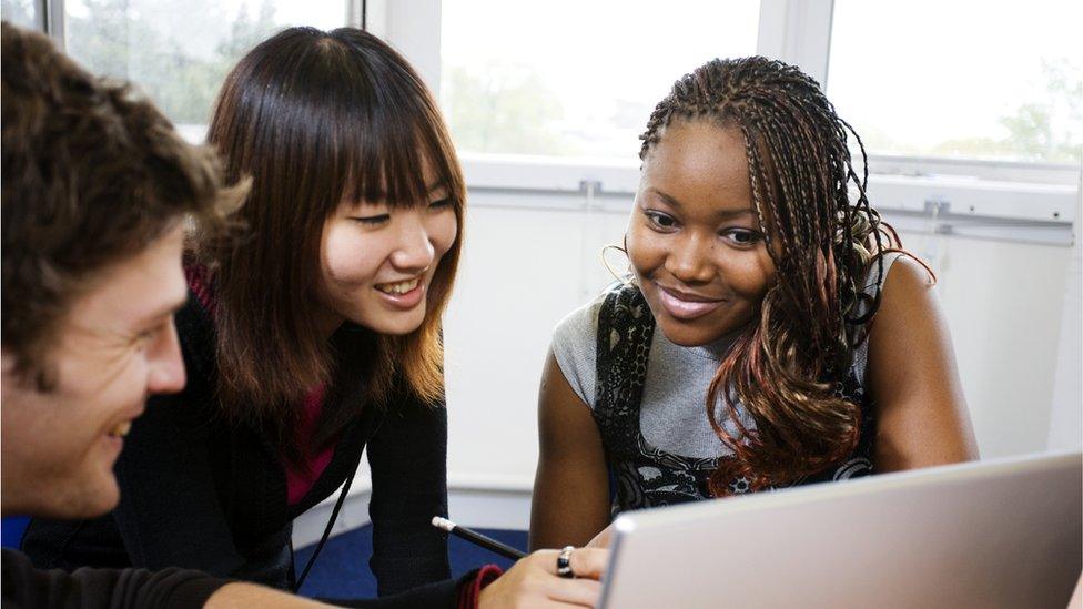 students-sat-at-desk