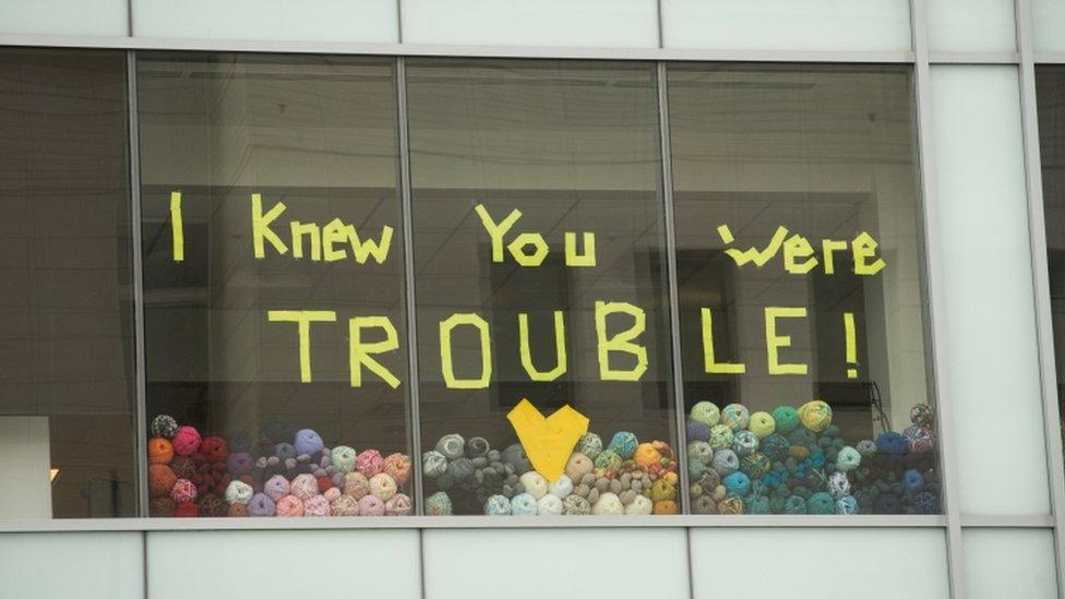 A message with Taylor Swift"s lyrics is displayed across the street from the Alfred A. Arraj Courthouse during the civil case for Taylor Swift vs David Mueller on August 10, 2017 in Denver, Colorado.