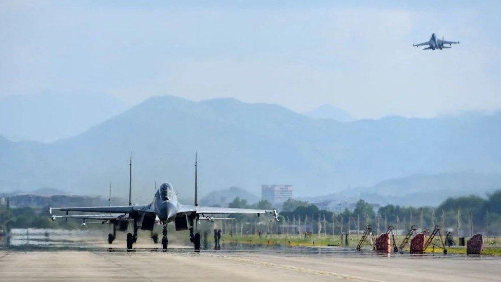 An Air Force aircraft under the Eastern Theatre Command of China"s People"s Liberation Army (PLA) takes off for military exercises in the waters around Taiwan