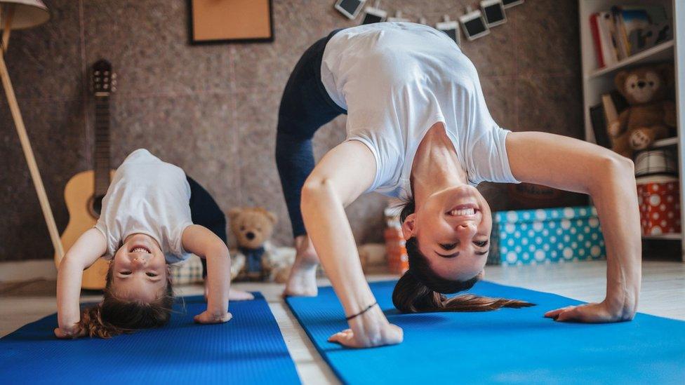 mum-and-daughter-exercising.