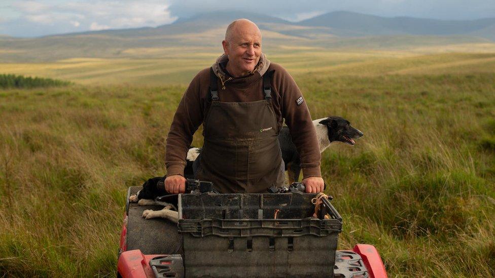 Farmer Hywel Morgan on a quad bike