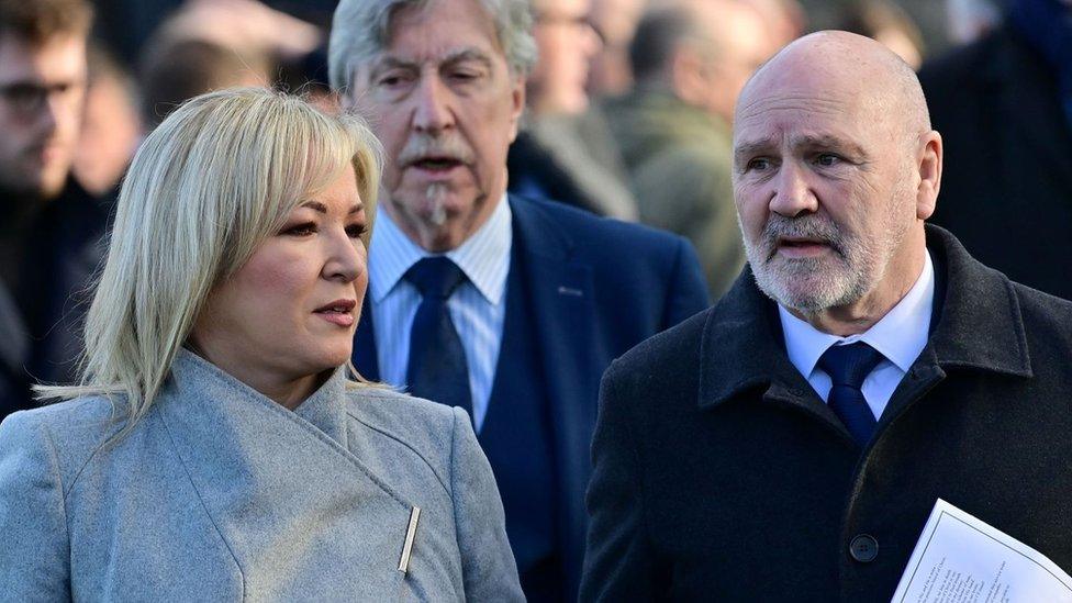 Alex Maskey and Michelle O’Neill at the funeral of Alec and Ann Easton