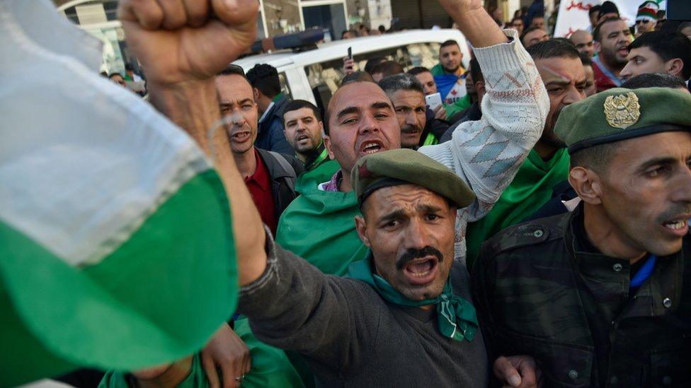 Veteran soldiers from Algeria's civil war take part in a demonstration against ailing Abdelaziz Bouteflika in the capital Algiers on 29 March 2019