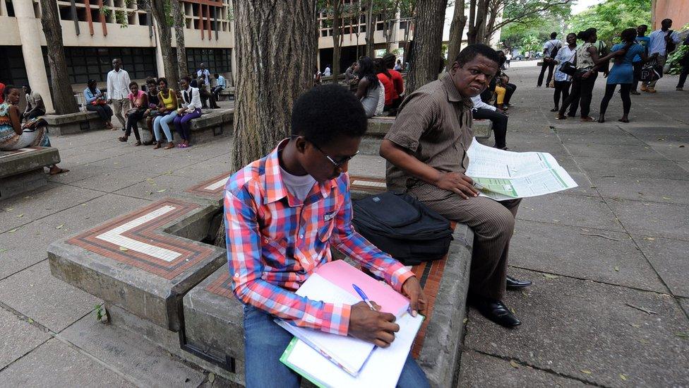 Students read at the University of Lagos, 2012