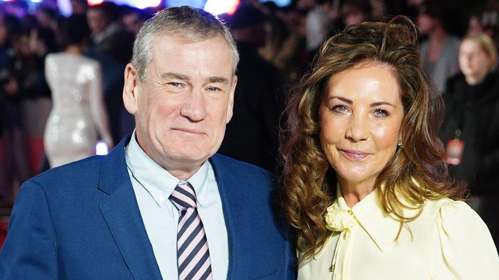 Mark Huffam and a woman guest at the UK premiere of Napoleon in London