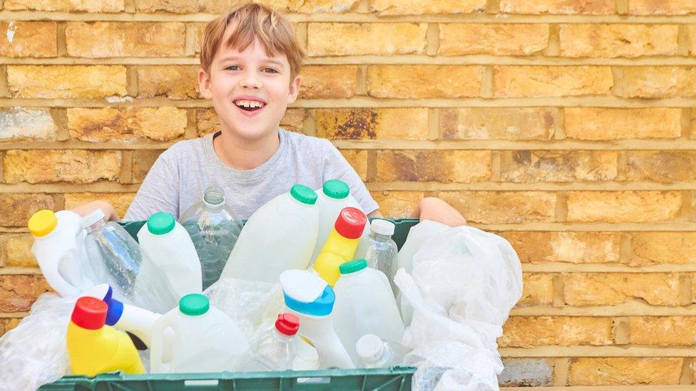 boy-holding-plastic-waste.