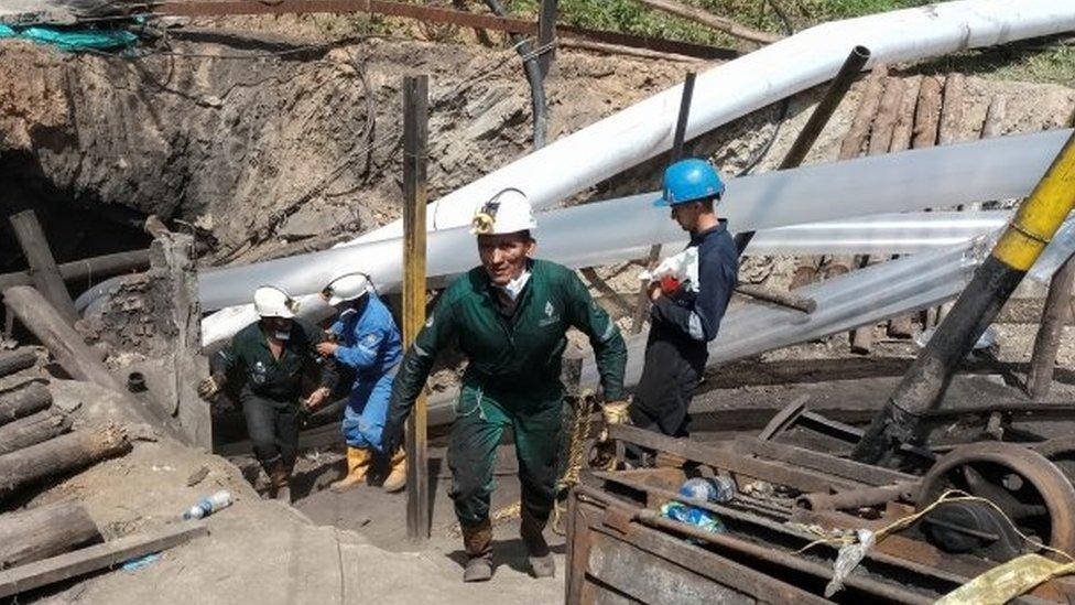 Workers from the National Mining Agency work outside a mine after an explosion in Zulia, Colombia June 2, 2022. Picture taken June 2, 2022.