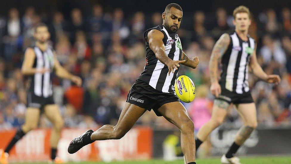 Héritier Lumumba playing in an AFL game for Collingwood Football Club