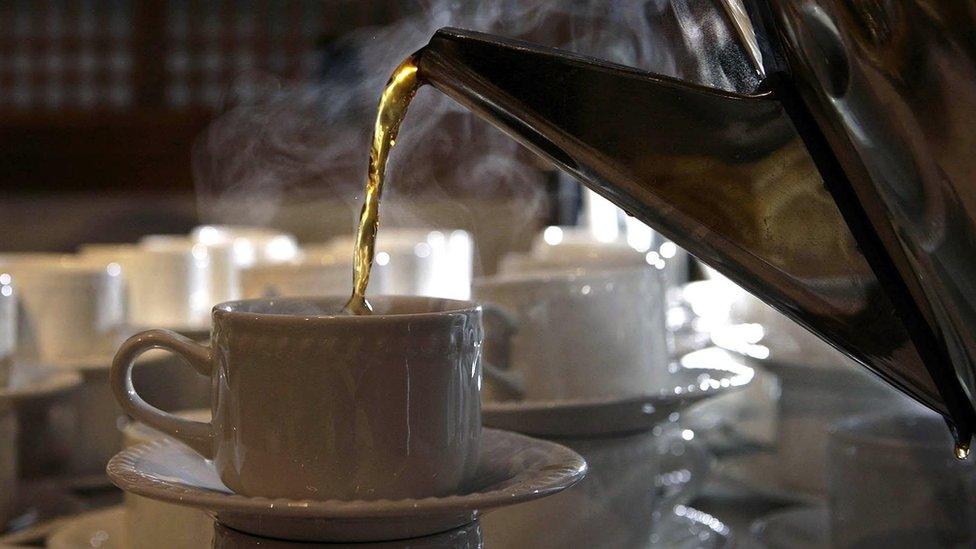 A cup of tea being poured