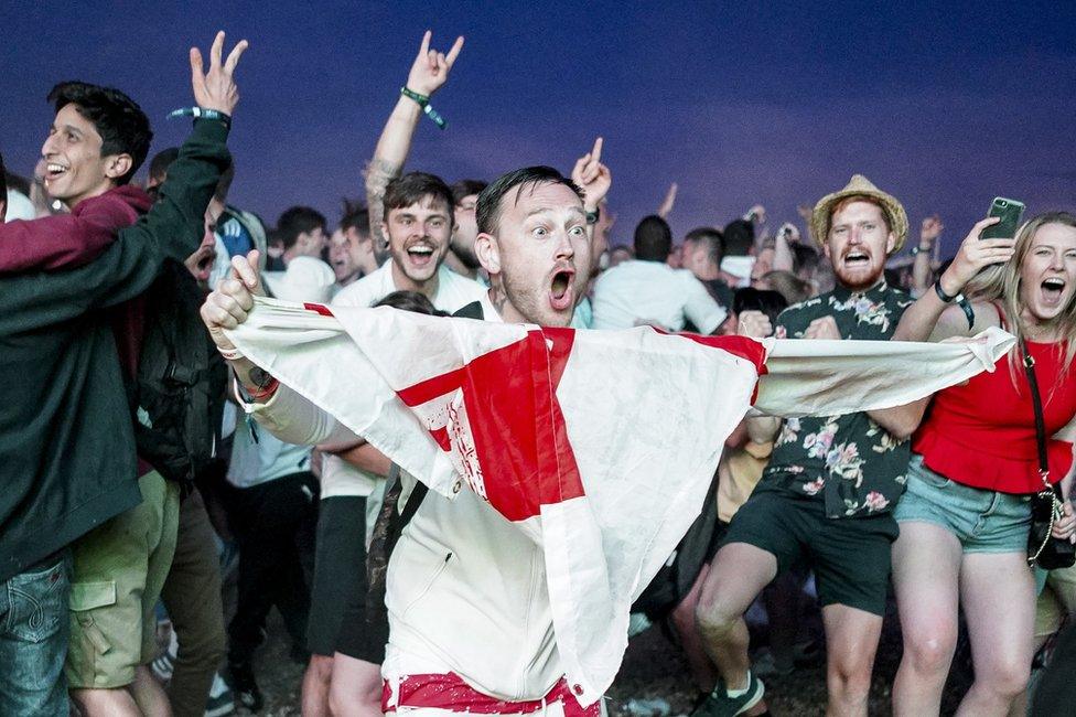 England fans celebrate on Brighton beach