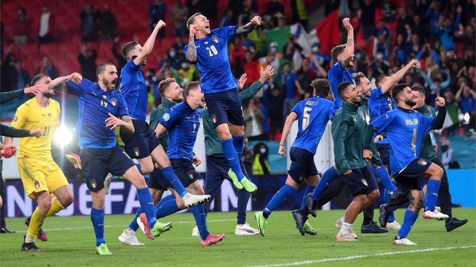 Italy players celebrate