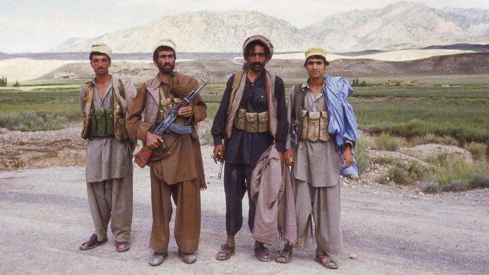 Members of the Mujahideen holding guns in Afghanistan in 1988