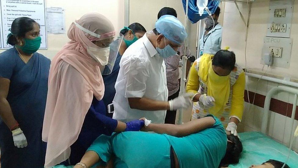 A girl receives medical treatment at a hospital after a gas leak at a chemical factory in Visakhapatnam, Andhra Pradesh state, southern India, 07 May 2020