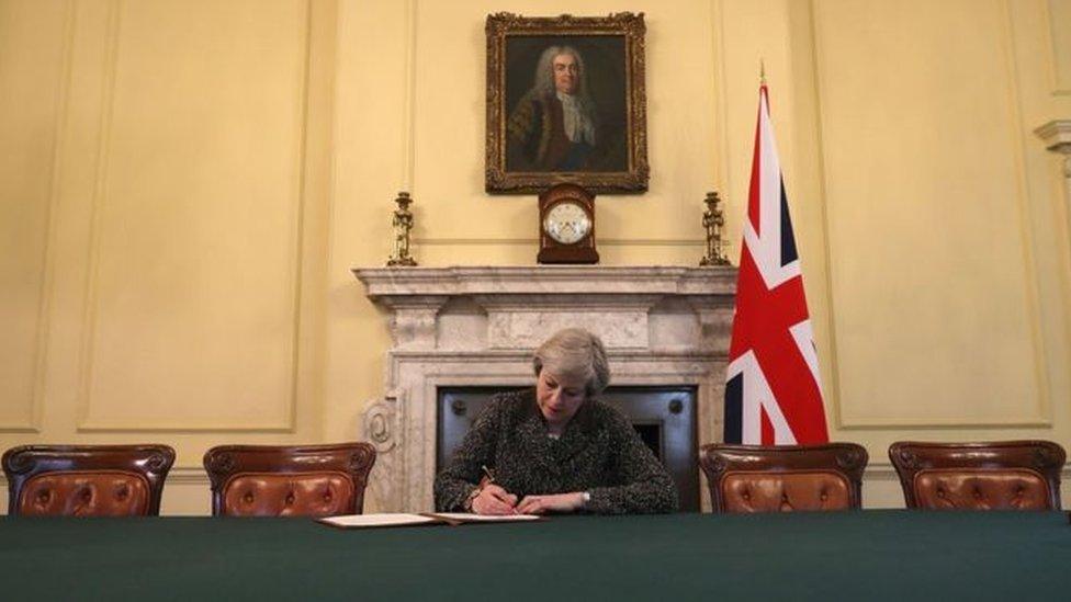 Theresa May signs the letter which will trigger Article 50, confirming the UK's departure from the EU.