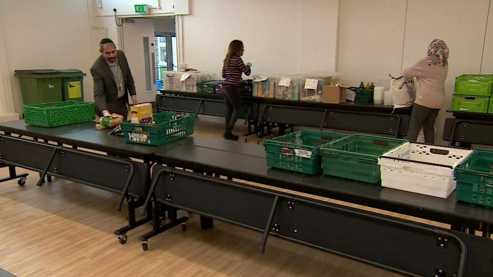 Teachers packing food parcels