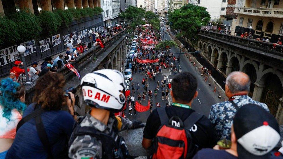 A pro-democracy march in Porto Alegre in southern Brazil, around 1,200 miles (1931km) from the capital Brasilia