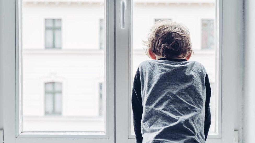 Child at window