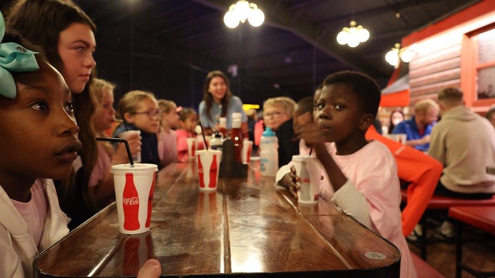 Children at summer scheme during cinema trip