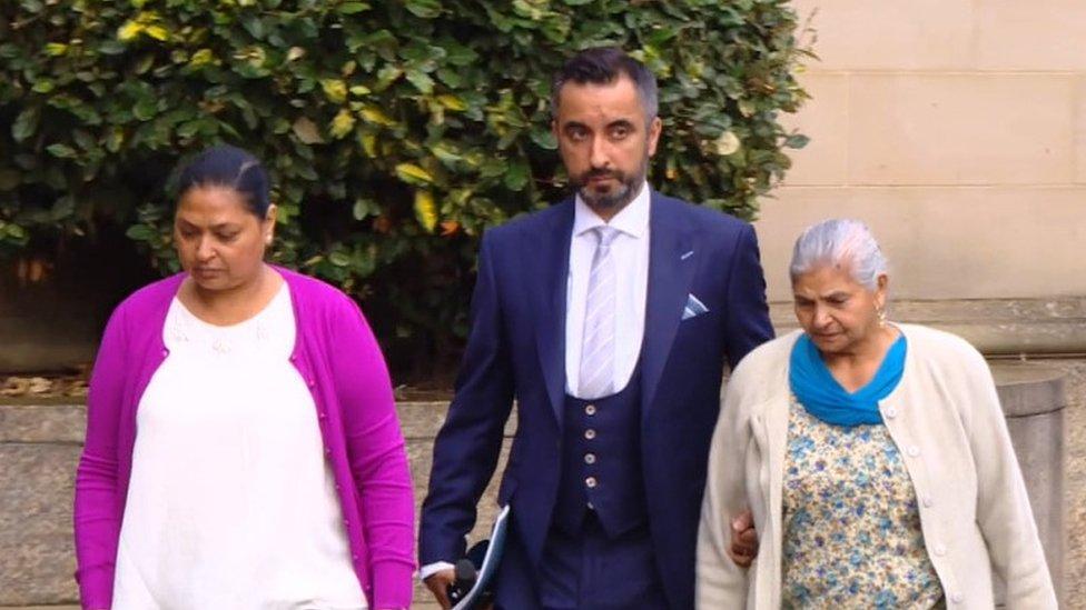 Lawyer Aamer Anwar arriving at court with members of Mr Chhokar's family