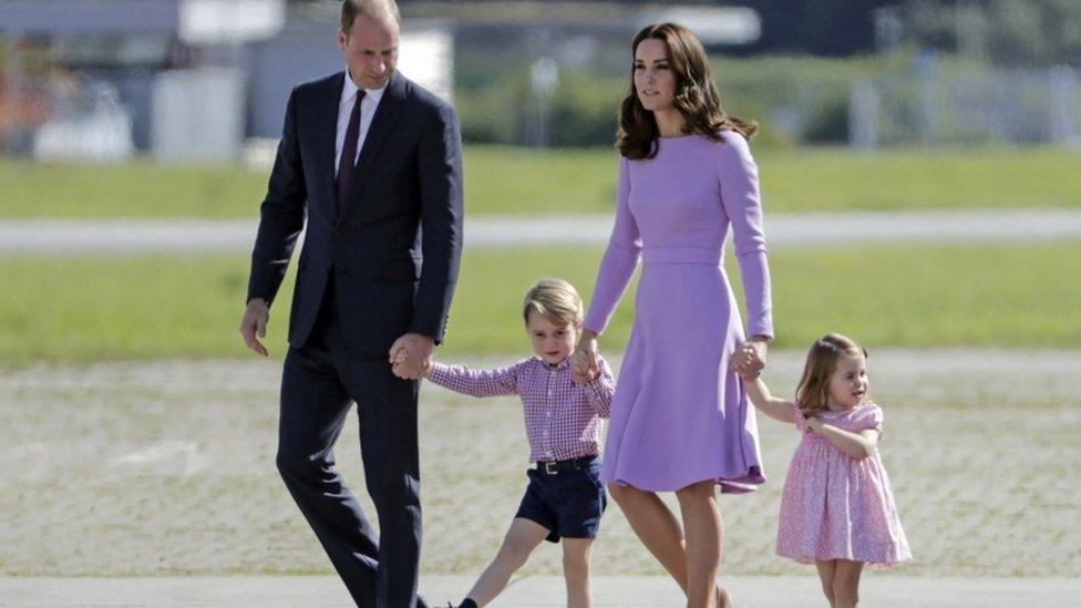 Britain's Prince William, Duke of Cambridge (L) and Catherine, Duchess of Cambridge (2-R) walk with their children Prince George (2-L) and Princess Charlotte during a farewell ceremony at the airport after visiting the Airbus Factory in Hamburg, Germany, 21 July 2017