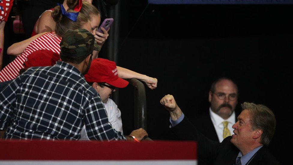 White House Chief Strategist Steve Bannon (R) fist bumps a supporter prior to a 'Make America Great Again Rally' at the Pennsylvania Farm Show Complex & Expo Center April 29, 2017 in Harrisburg, Pennsylvani