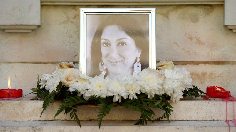 Flowers and tributes laid at the foot of the Great Siege monument in Valletta, Malta on 19 October