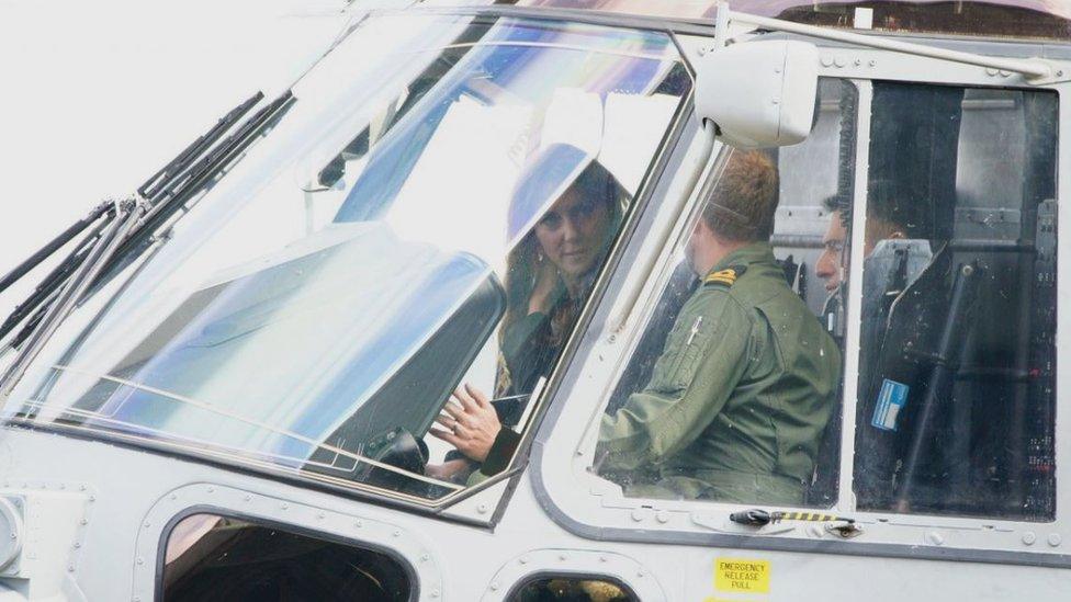 The Princess of Wales sits inside the cockpit of a Merlin Mk2 helicopter during a visit to the Royal Naval Air Station (RNAS) Yeovilton, near Yeovil in Somerset