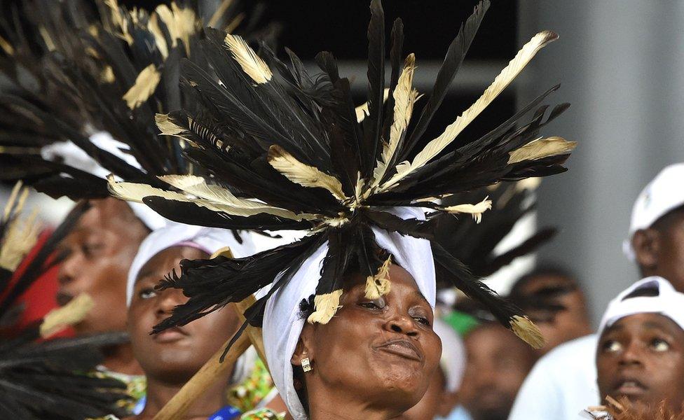 A football fan from the DR Congo wearing a feather headdress at a Africa Cup of Nations match in Oyem , Gabon - Monday 16 January 2017