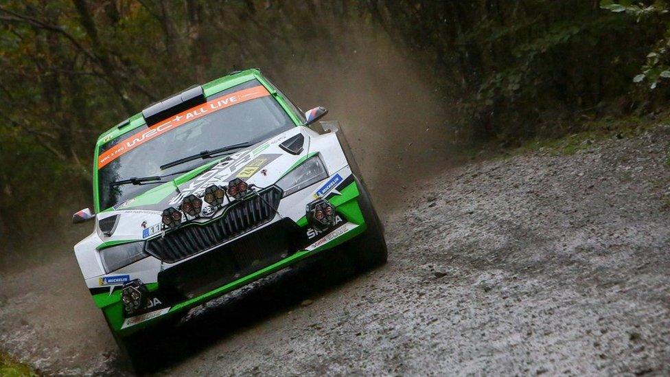 Czech driver Jan Kopecky and co-pilot Pavel Dresler drive their Skoda Fabia R5 Evo as they compete in the Penmachno stage