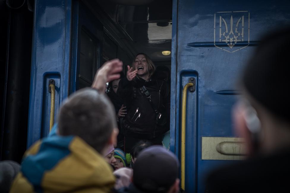 People in Dnipro, eastern Ukraine, wait to depart by train to the country's western regions. Photo: 2 March 2022