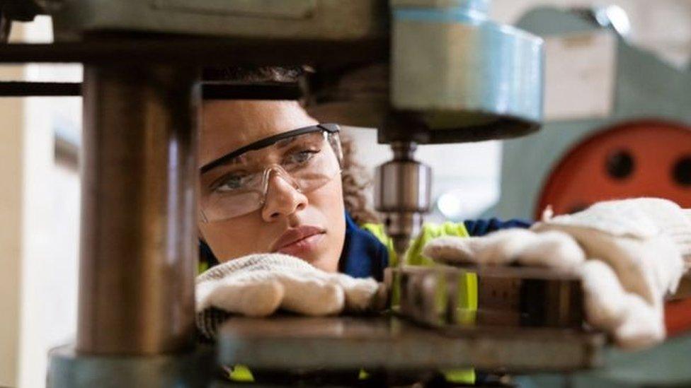 Woman at machinery