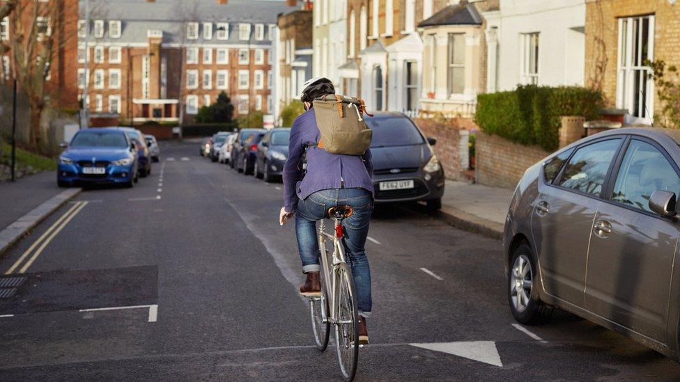 Cyclist riding in the street