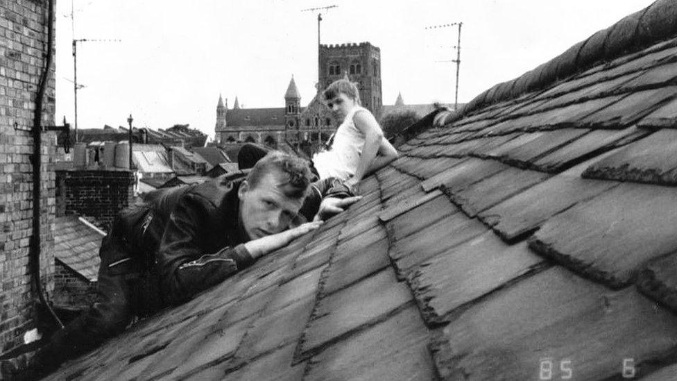 Sam Tharby and and Dave Kotula, 1985, Lower Dagnell Street roof checking out the cathedral