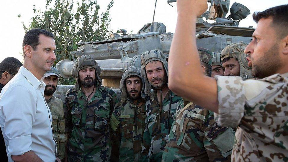 Syrian President Bashar al-Assad speaks to troops on the frontline near Damascus on 26 June 2016