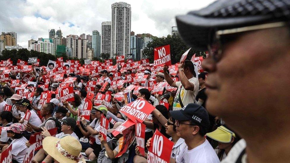 Protesters attend a rally against a controversial extradition law proposal in Hong Kong on 9 June 2019