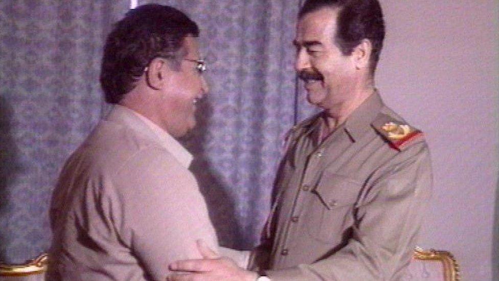 PUK leader Jalal Talabani and Iraqi President Saddam Hussein