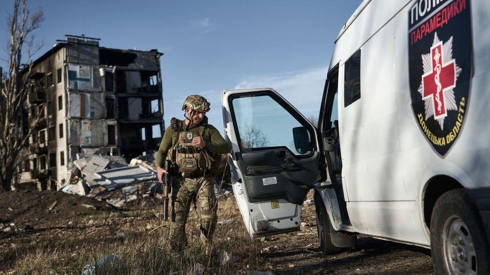 Police officer Gennady conducts evacuation work on October 30, 2023 in Avdiivka, Ukraine