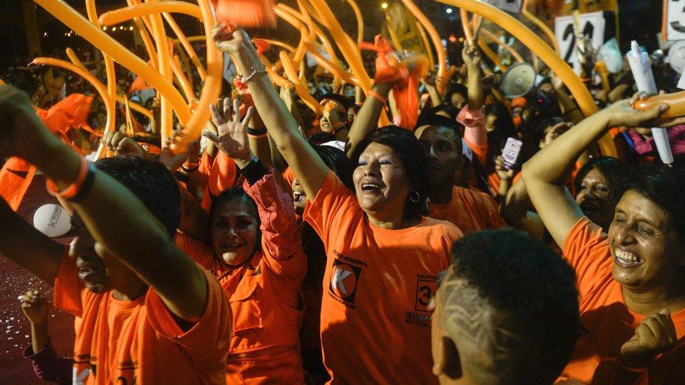 Supporters of Keiko Fujimori participate in a rally in Lima on March 31, 2016