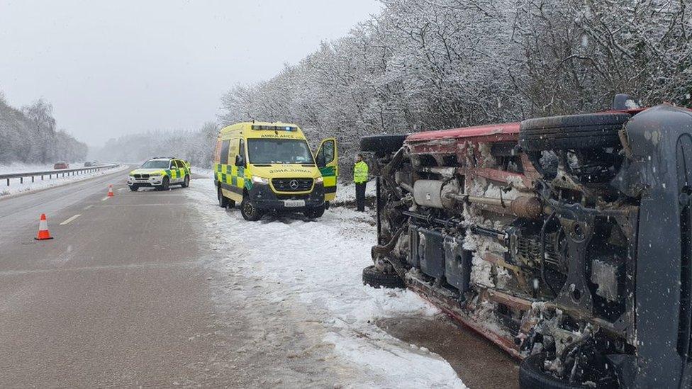 Overturned car on M54