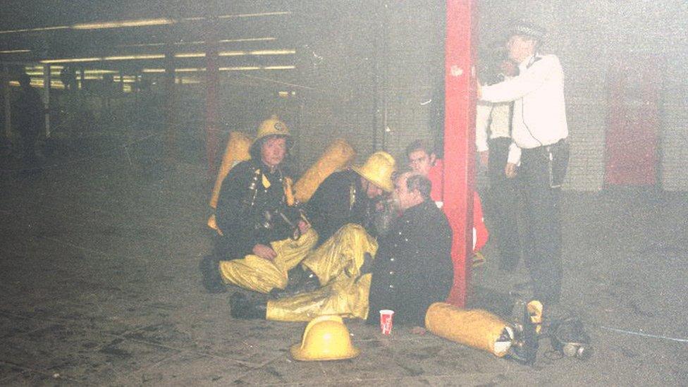 Firefighters in King's Cross station on 18 November 1987