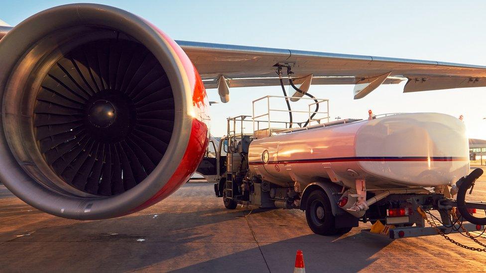 Plane getting refuelled