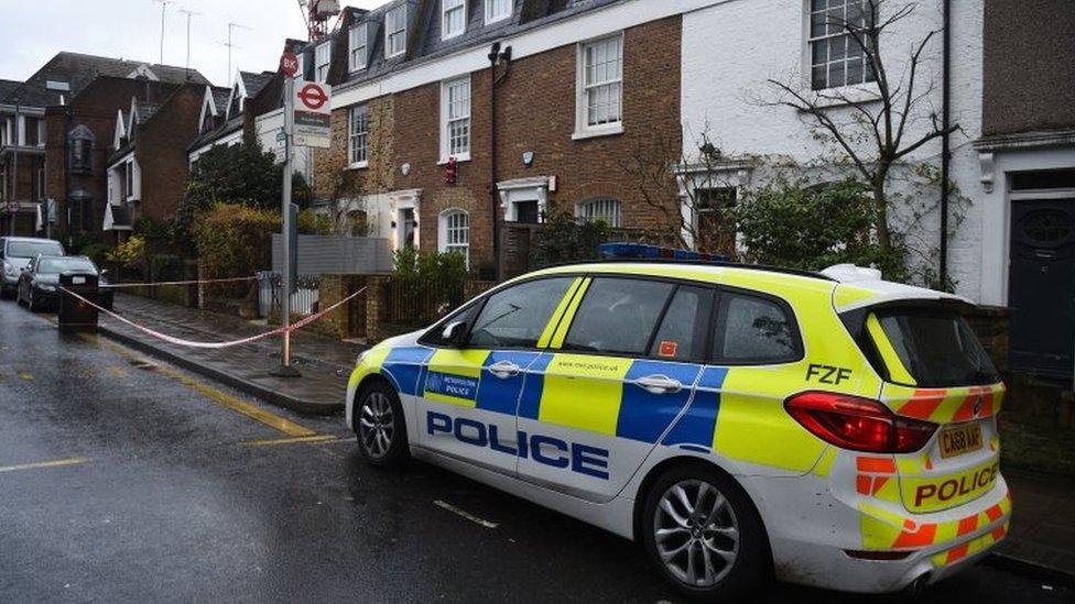 Police remained at the scene in Battersea Church Road