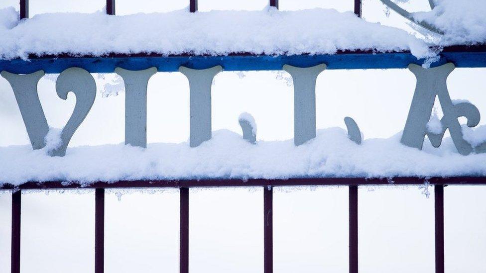 Snowy gates at Villa Park