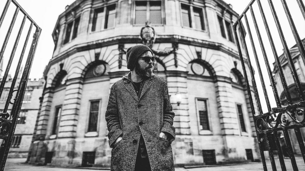 Gaz Coombes in front of the Sheldonian Theatre