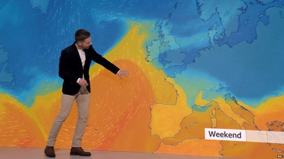 Tomasz Schafernaker presents the weather live from studio